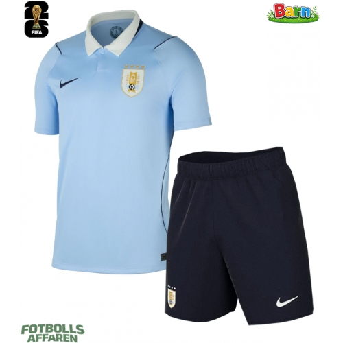 Uruguay Hemmaställ Barn VM 2026 Kortärmad (+ Korta byxor)